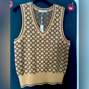 Trina Turk vest in M. Layer or alone. Love that the pattern is on the back too.